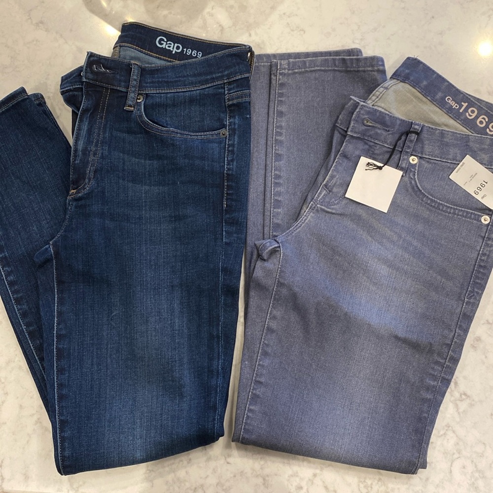 Two pairs of gap skinny jeans - one with tags
